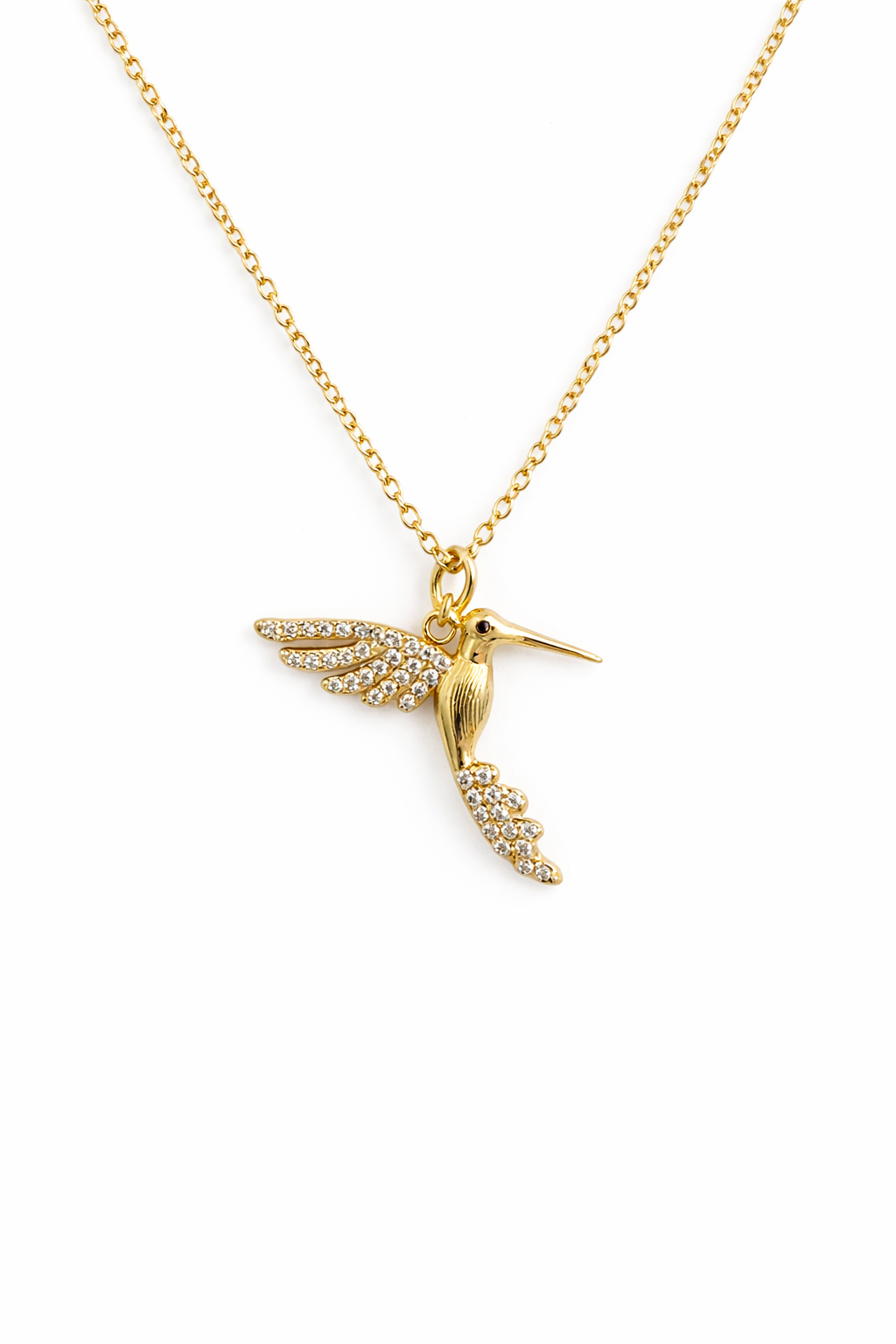 Gold hummingbird pendant necklace on a white background