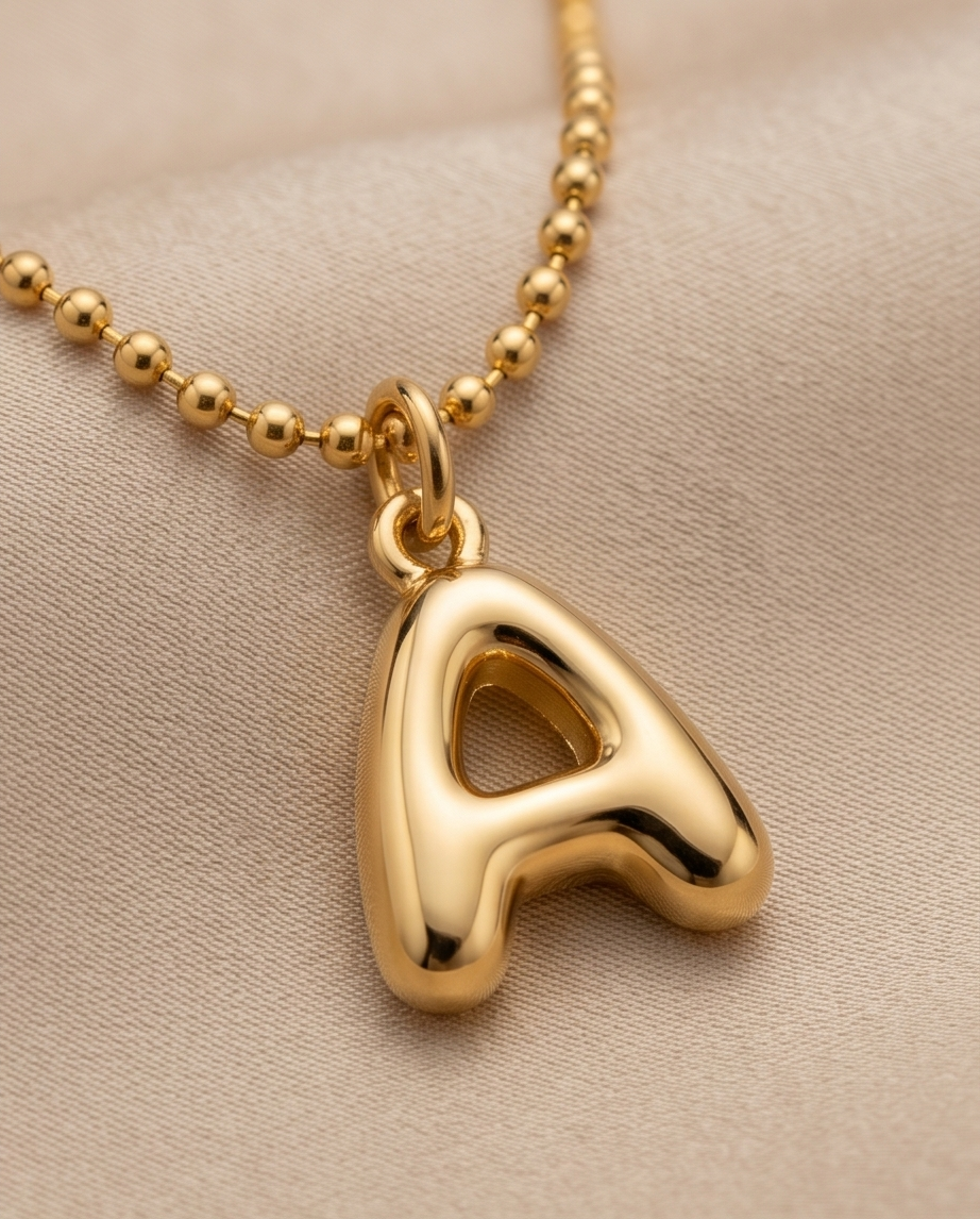 lose up of 18k gold filled bubble letter A pendant on gold beaded chain — Make It Mine by Stacked by Jayneebell