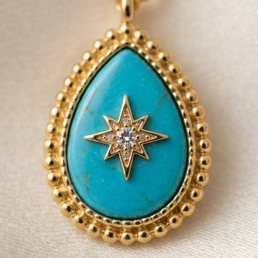 Close-up detail of True North turquoise inlay and pavé CZ north star with gold milgrain border, Stacked by Jayneebell