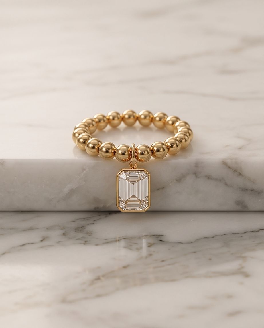 The Heirloom moissanite stretch ring displayed on marble | Stacked by Jayneebell