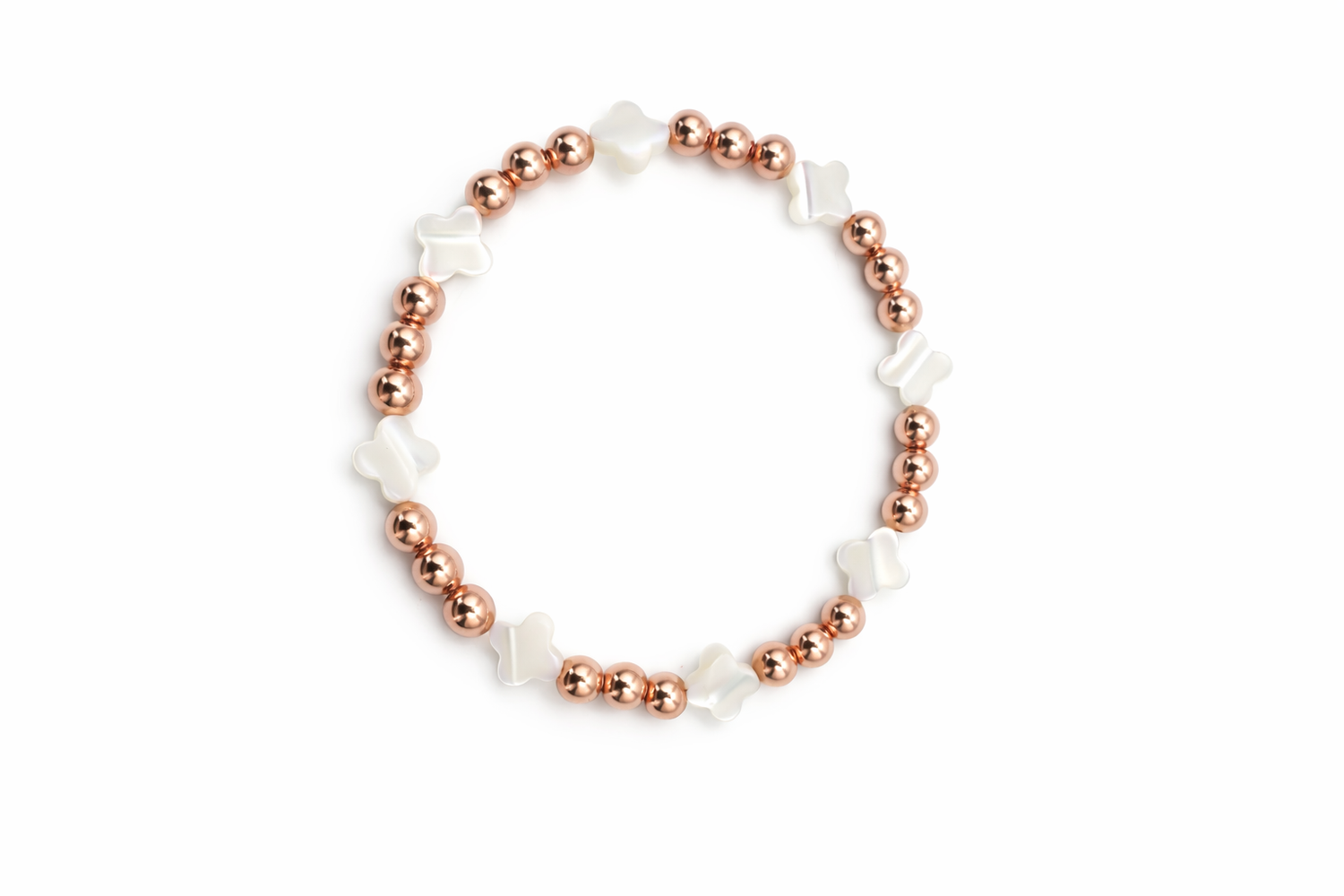 Bracelet with rose gold and white beads on a white background