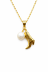 Gold necklace with a cowboy boot and pearl pendant on a white background