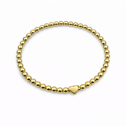 beaded bracelet with a heart on a white background