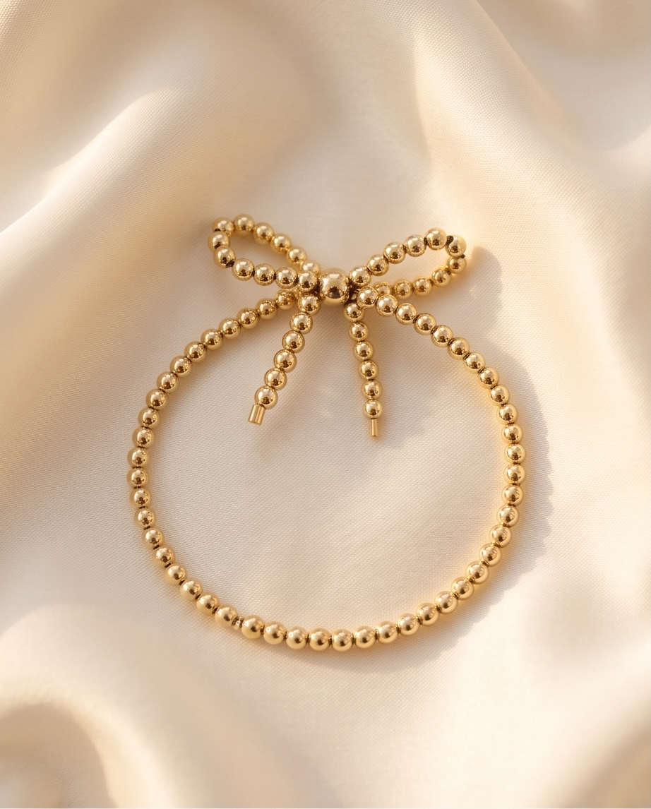 14k gold filled beaded bow bracelet on cream satin — The Coquette by Stacked by Jayneebell