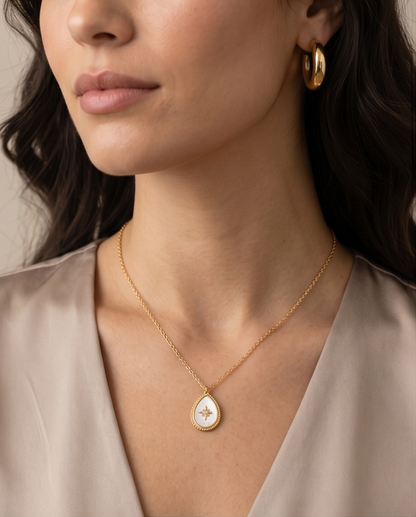 Model wearing True North mother of pearl gold milgrain north star pendant necklace with silk top, Stacked by Jayneebell
