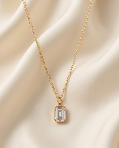 2 carat emerald cut lab diamond pendant on 14k gold filled chain on cream satin — The Luminaire by Stacked by Jayneebell