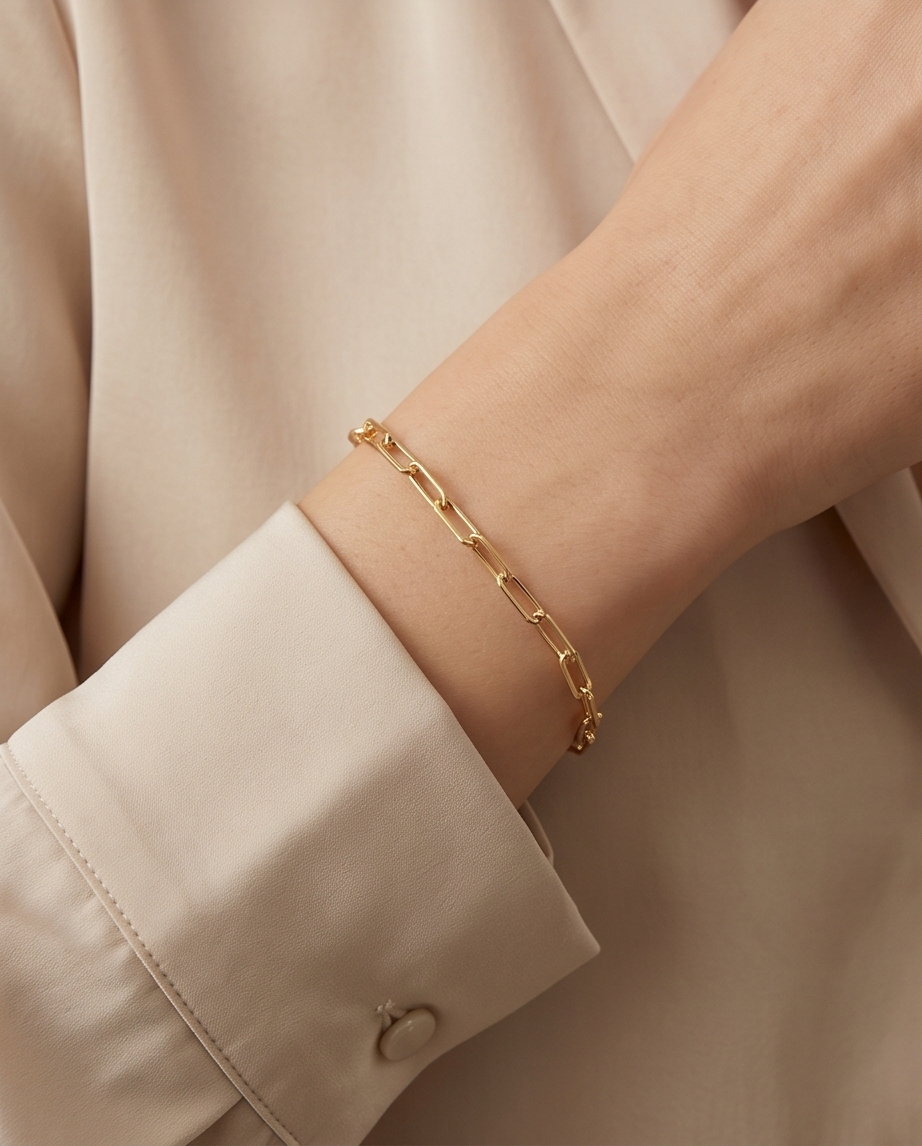 14k gold filled thick paperclip chain bracelet worn on wrist with blazer — Linked by Stacked by Jayneebell