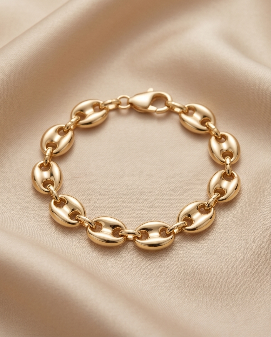 old filled puff mariner oval link bracelet on cream satin — The Puff by Stacked by Jayneebell