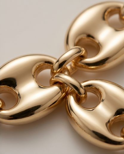 Close up detail of oversized puff mariner oval links on 14k gold filled bracelet — Stacked by Jayneebell