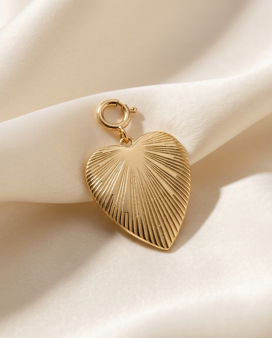 14k gold filled sunray heart charm with spring clasp on cream satin — Wild Heart by Stacked by Jayneebell
