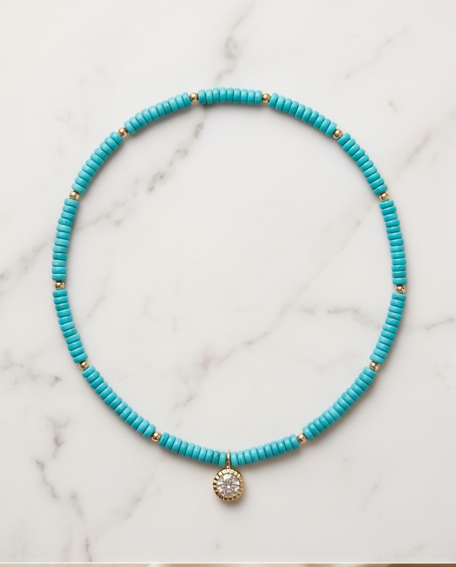 16 inch turquoise disc bead stretch necklace with CZ solitaire gold filled pendant on marble — Stacked by Jayneebell