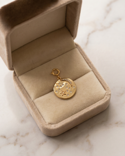 Gold filled celestial moon charm in tan velvet jewelry box on marble — Moonchild by Stacked by Jayneebell