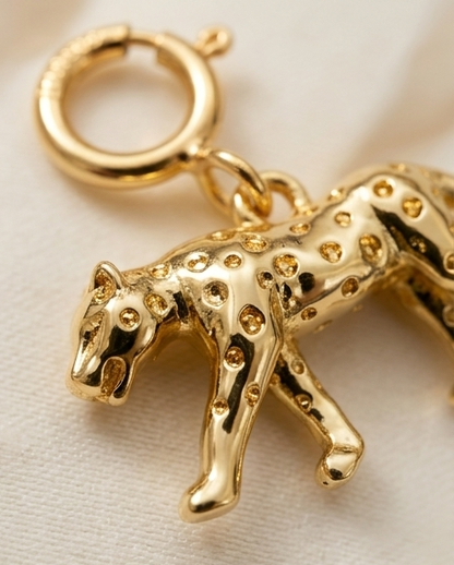 Close up detail of gold filled cheetah charm with spot texture and spring clasp — Stacked by Jayneebell