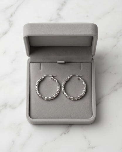 The Rope twisted silver hoop earrings in grey velvet gift box on marble, Stacked by Jayneebell