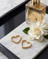  Open Heart gold PVD heart huggie hoop earrings on marble, Stacked by Jayneebell