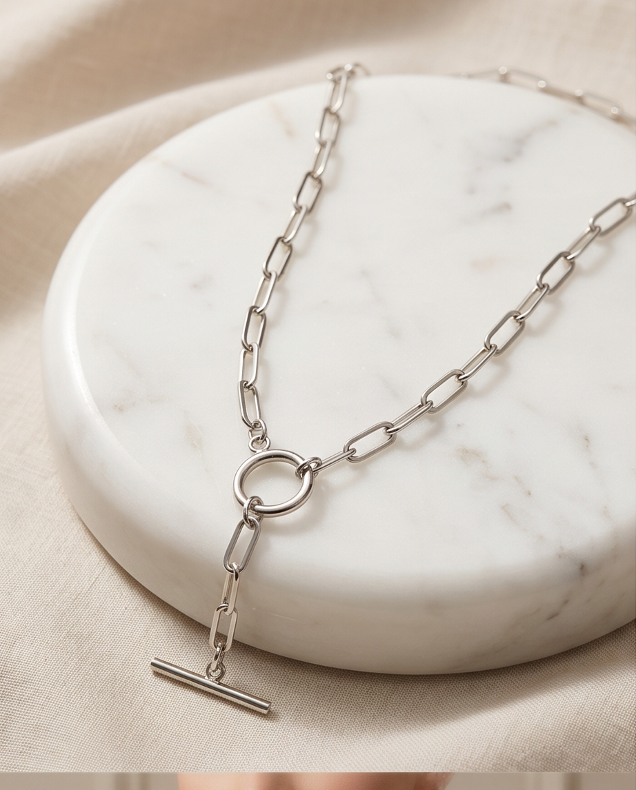 Bar None silver PVD paperclip chain T-bar necklace on marble disc, Stacked by Jayneebell