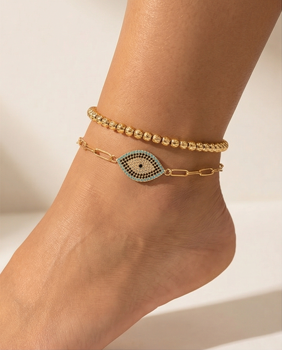 Gold anklets on a person&