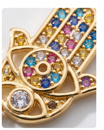 Close up of Rainbow Hamsa charm with multicolor CZ stones — Stacked by Jayneebell